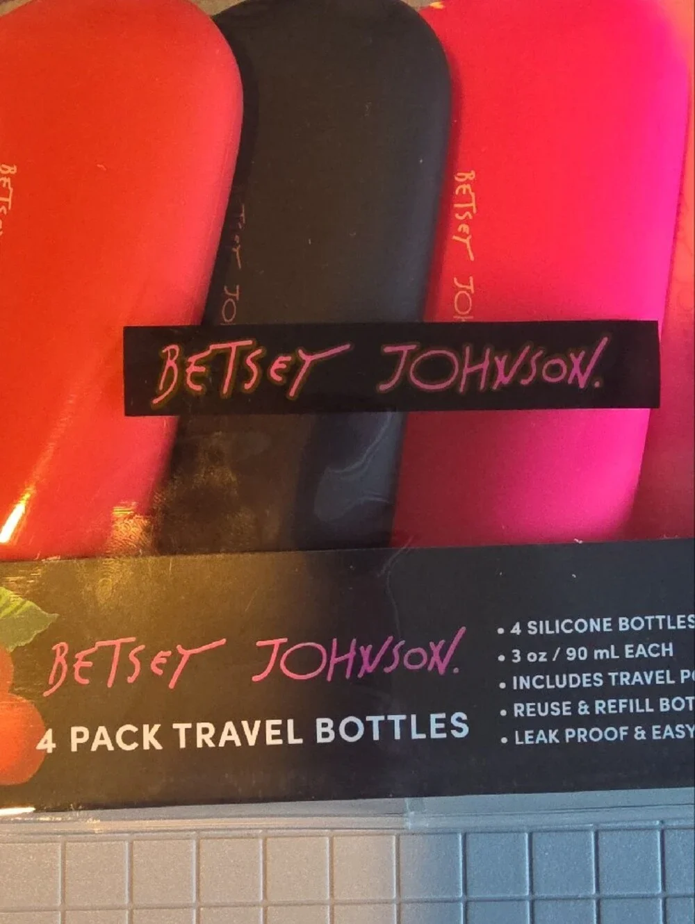 Betsey Johnson Pink, Hot Pink & Black Silicone Travel Bottle Set